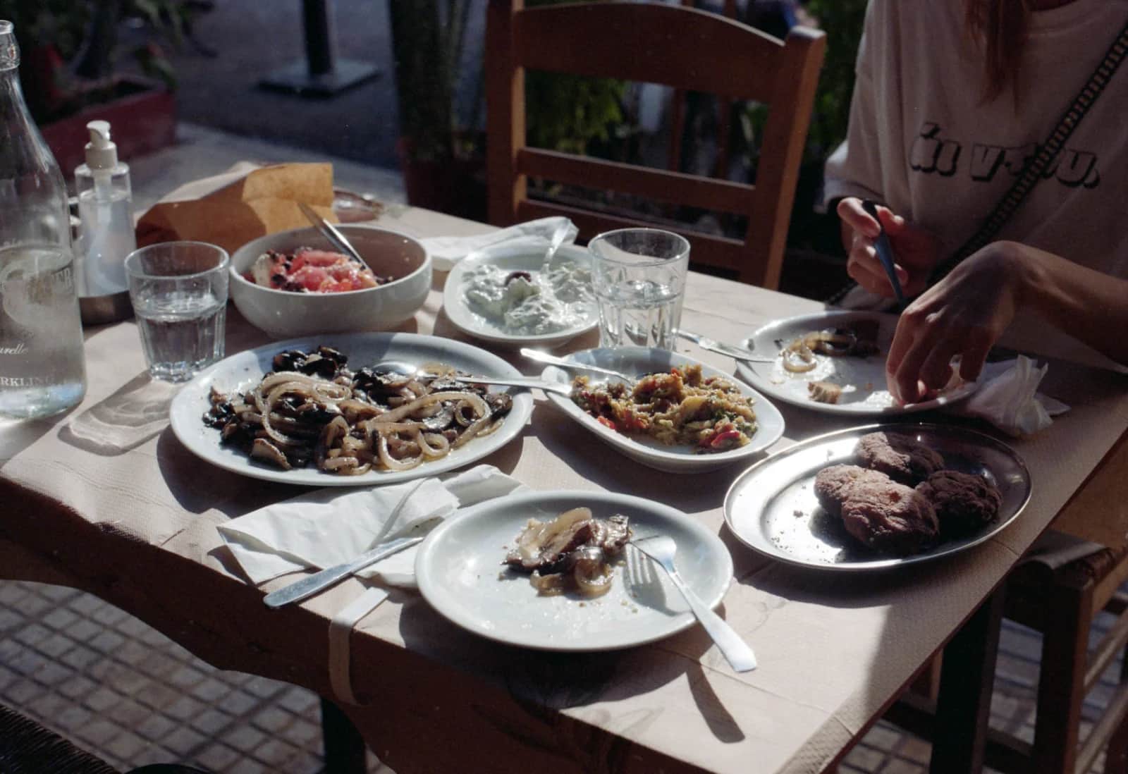 A plate of traditional pastitsada with pasta served at a local restaurant in Corfu